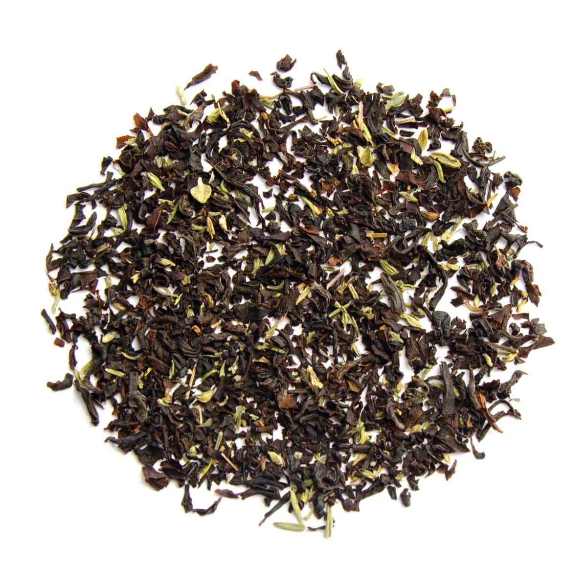 Mountain Herbs - Lose schwarze Teeblätter im Kreis angeordnet